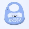 BABERO SILICONA AZUL ANIMALES